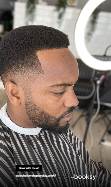 Professional Afro haircut with fade